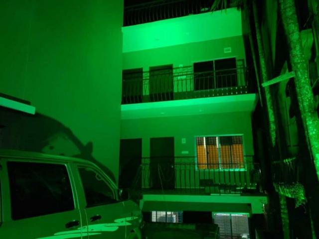 Front view of running stream resort at night